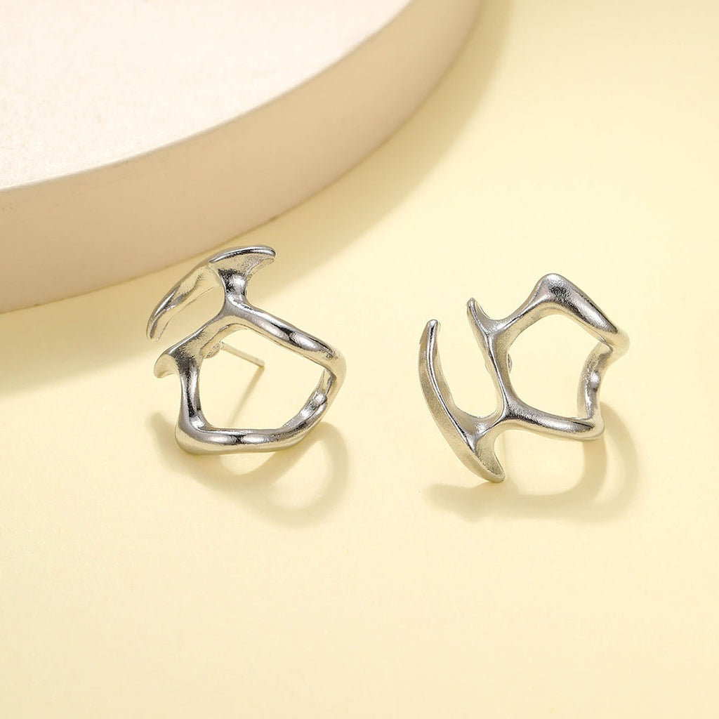 Hot selling cold wind irregular hollow out metal earrings for female personality niche design, internet celebrity high-end sense earrings